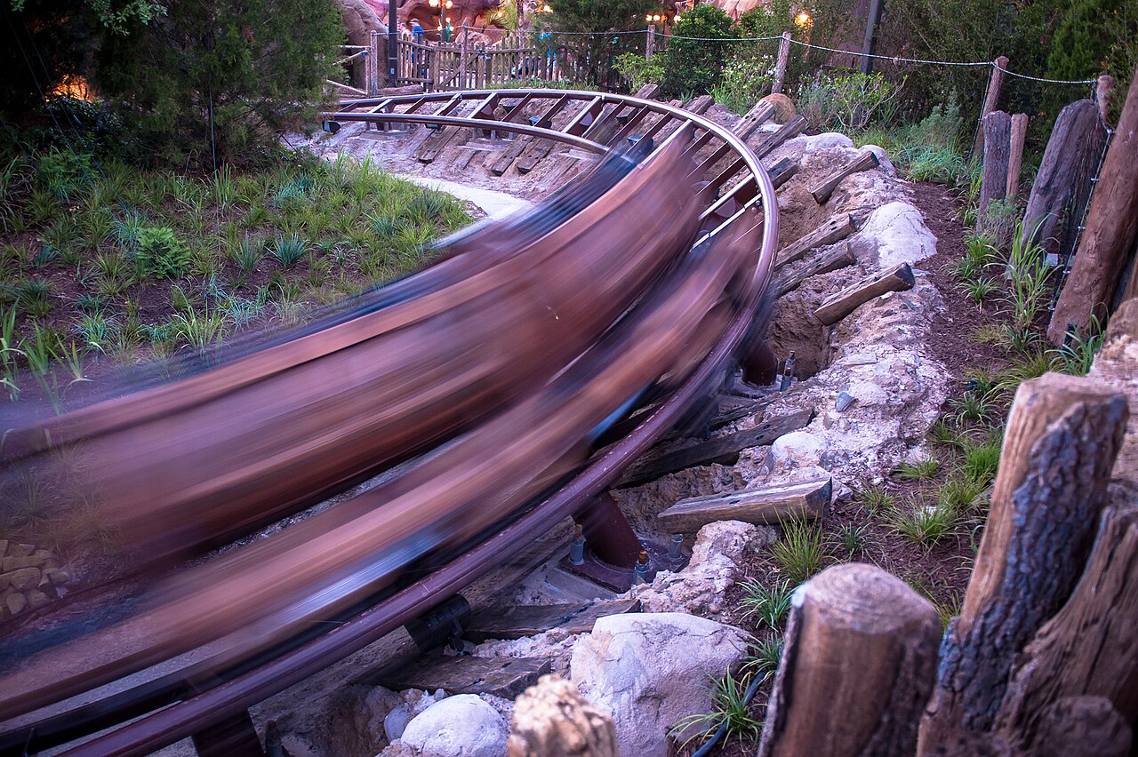 A long exposure of a train blurring through a curve