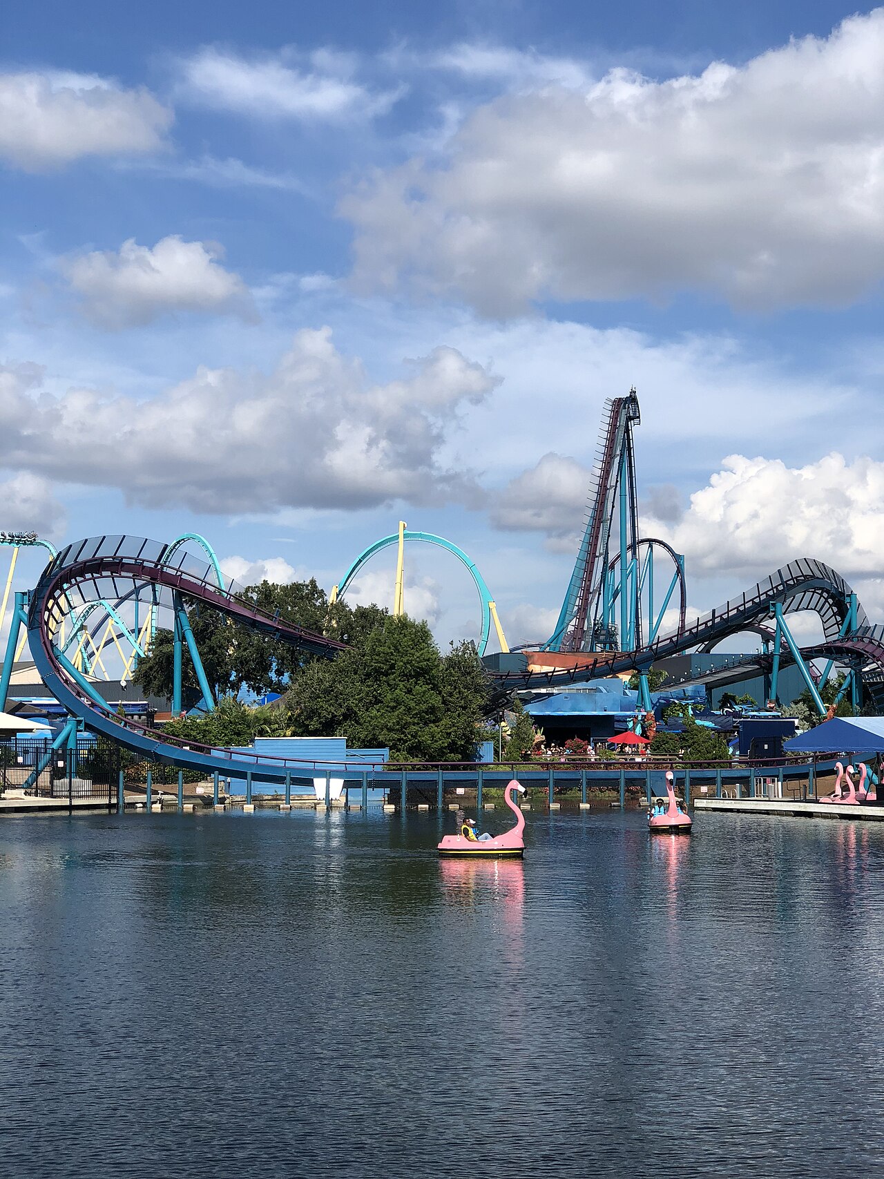 View of Mako roller coaster from across park's lake showing lift hill and end of layout