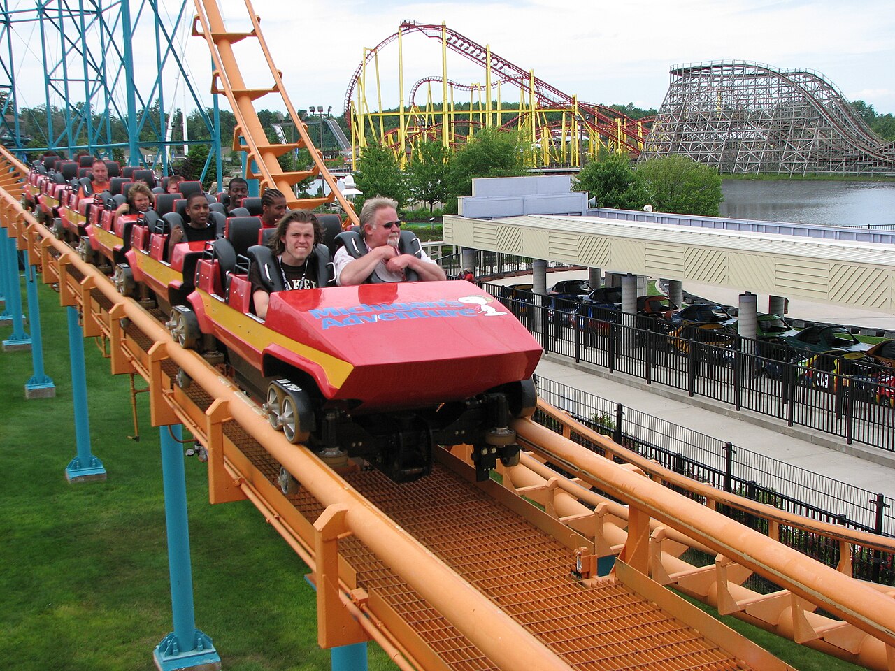 Corkscrew cars returning to ride's station at Michigan's Adventure