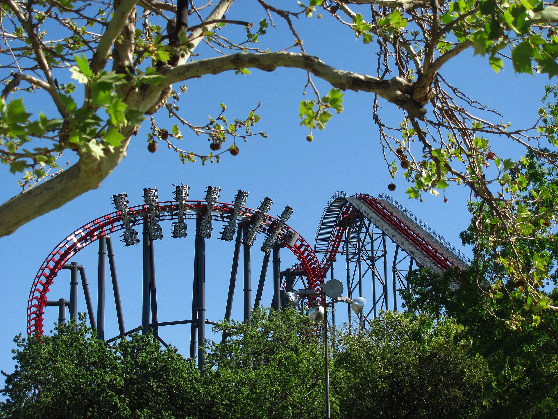 X2's red track and grey supports against a blue sky