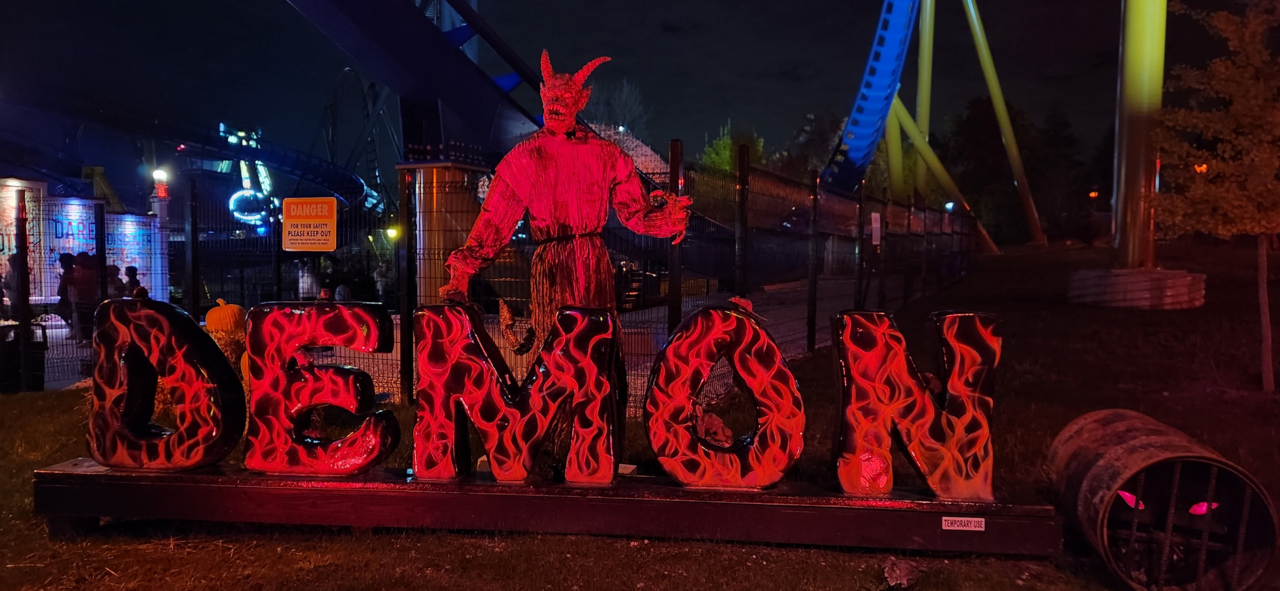 The sign for the Demon roller coaster during Fright Fest 2025 at Six Flags Great America